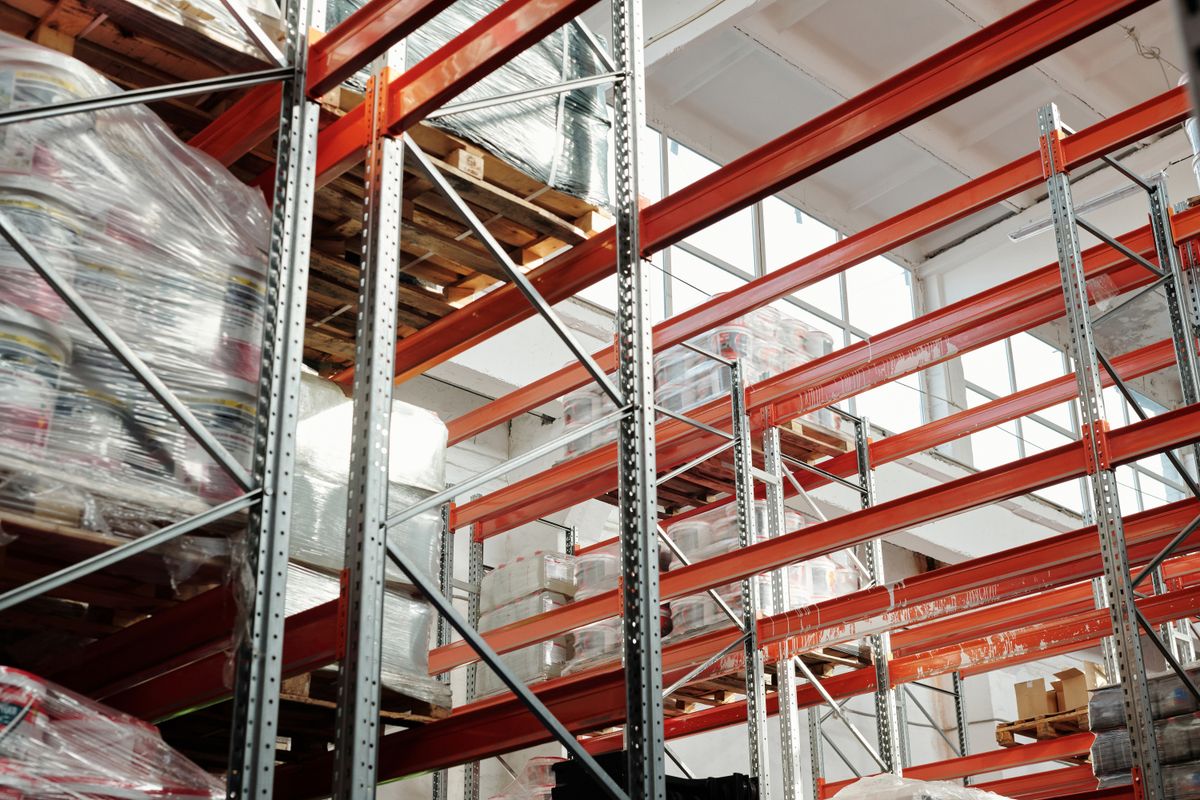 Warehouse storage racking holding palletized industrial materials